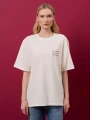 Koszulka-Szymborka-nic dwa razy-oversize-nadwyrazcom-1.webp